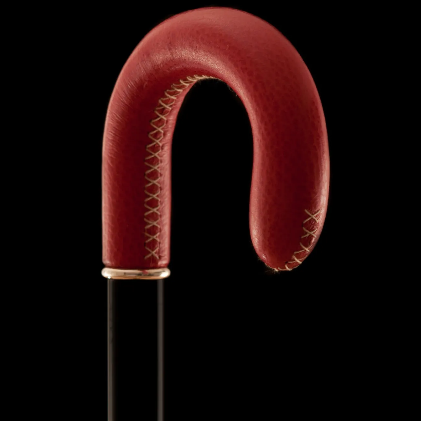 Bastone da passeggio tradizionale con impugnatura bianca e rossa