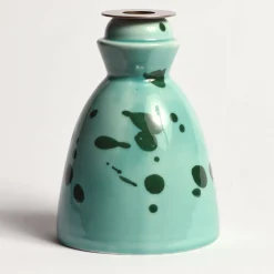 Candeliere in ceramica verde con 4 candele profumate