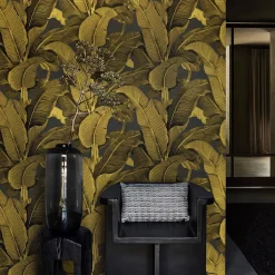 Carta da parati con foglie di banano dorate