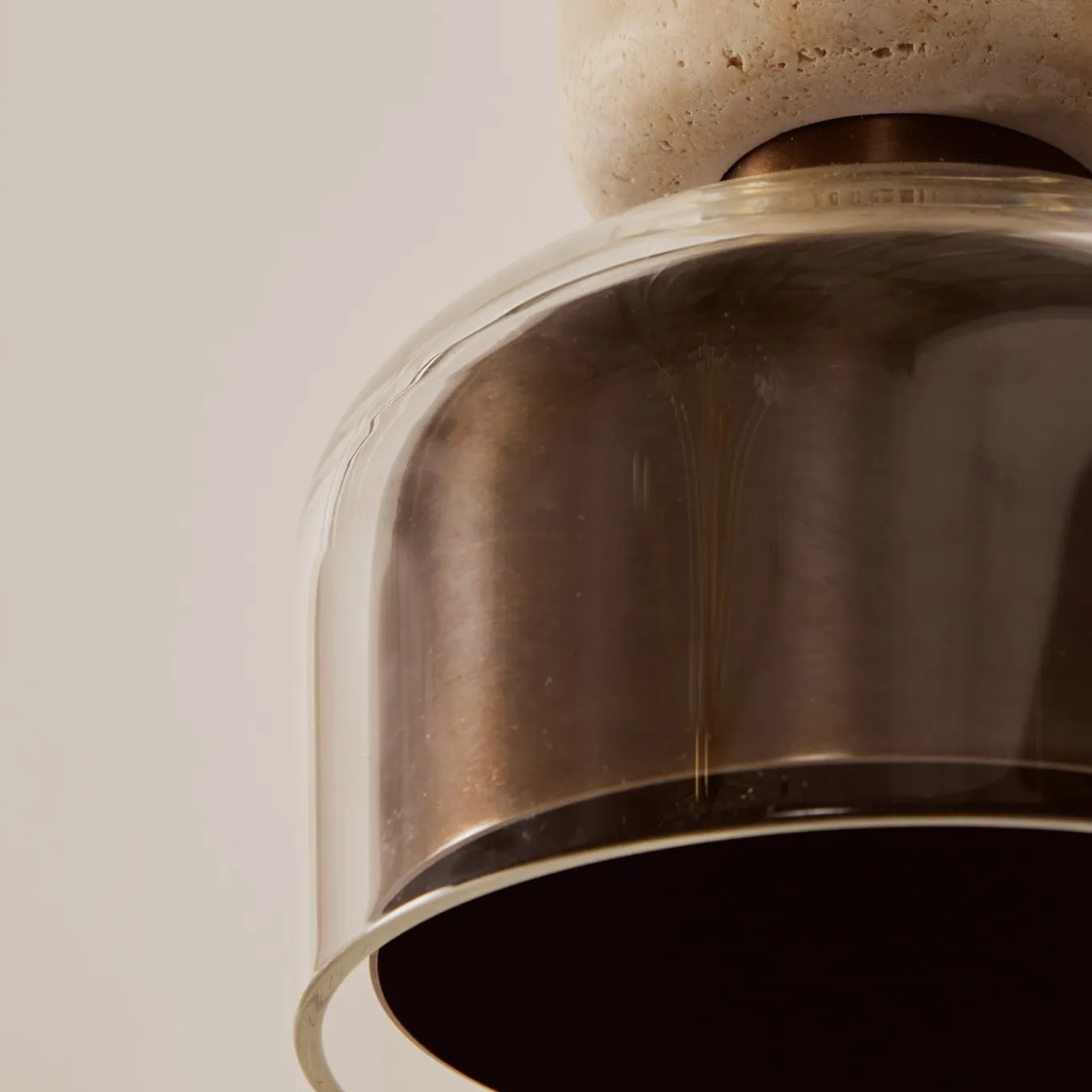 Ciondolo "Andromeda" in travertino e bronzo