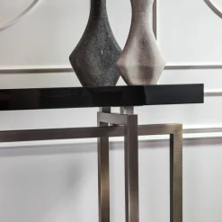 Console Charlotte con base in metallo bronzato