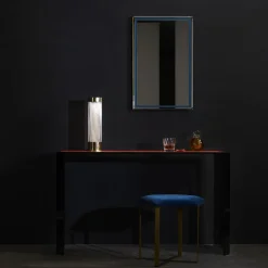 Consolle Jean Michel in vetro grigio fumé e pelle rossa