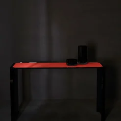 Consolle Jean Michel in vetro grigio fumé e pelle rossa