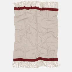 Coperta con frange a banda rossa