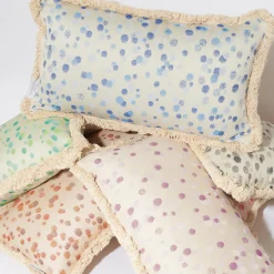 Cuscino piccolo con frange color crema e giallo