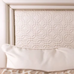 Letto matrimoniale a baldacchino in pelle bianca e bronzo dorato