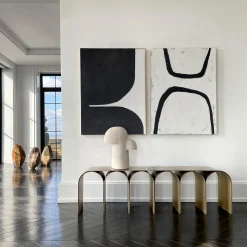 Panchina in acciaio con arco d'oro e bronzo