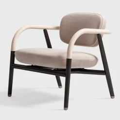 Poltrona occasionale in pelle e tessuto color crema