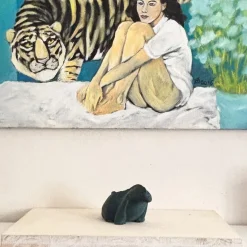 Scultura di iguana verde