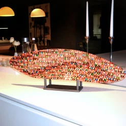 Scultura di sole rosso Onda