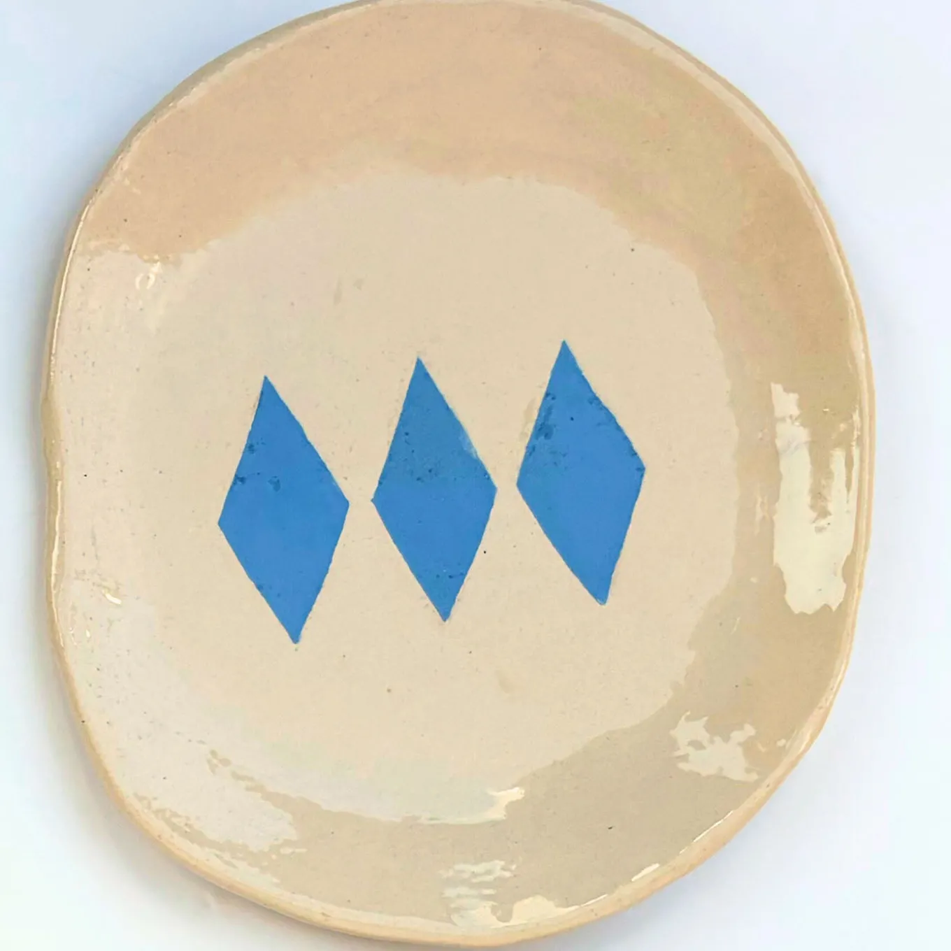 Set di 4 piatti Arlecchino in ceramica avorio e azzurro