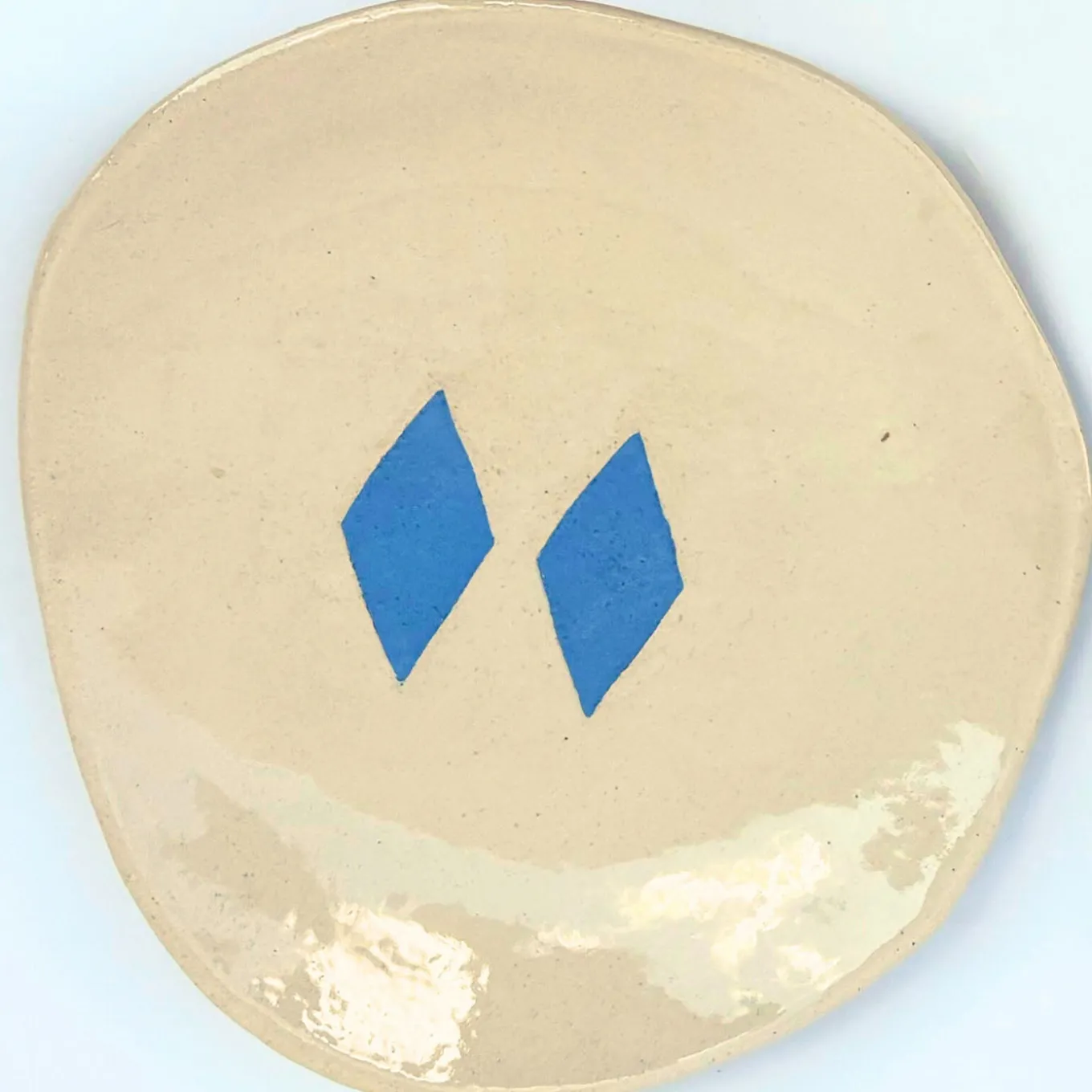 Set di 4 piatti Arlecchino in ceramica avorio e azzurro