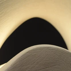 Sorriso del mare scultura luminosa in pietra di lecce