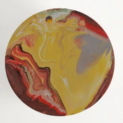 Tavolino rotondo Astraliti in metallo dai toni caldi #1