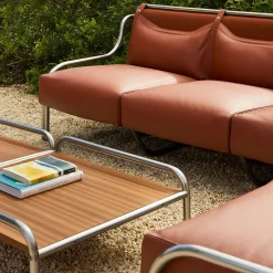 Tavolino Stringa in mogano e acciaio inox di Gae Aulenti