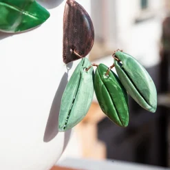 Vaso con testa di venditore di olio Oliva