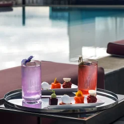 Vassoio rotondo in acciaio inox Stile