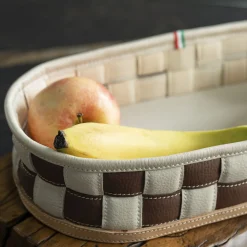 Videopoche ovale annodata in ecopelle marrone e crema Procida